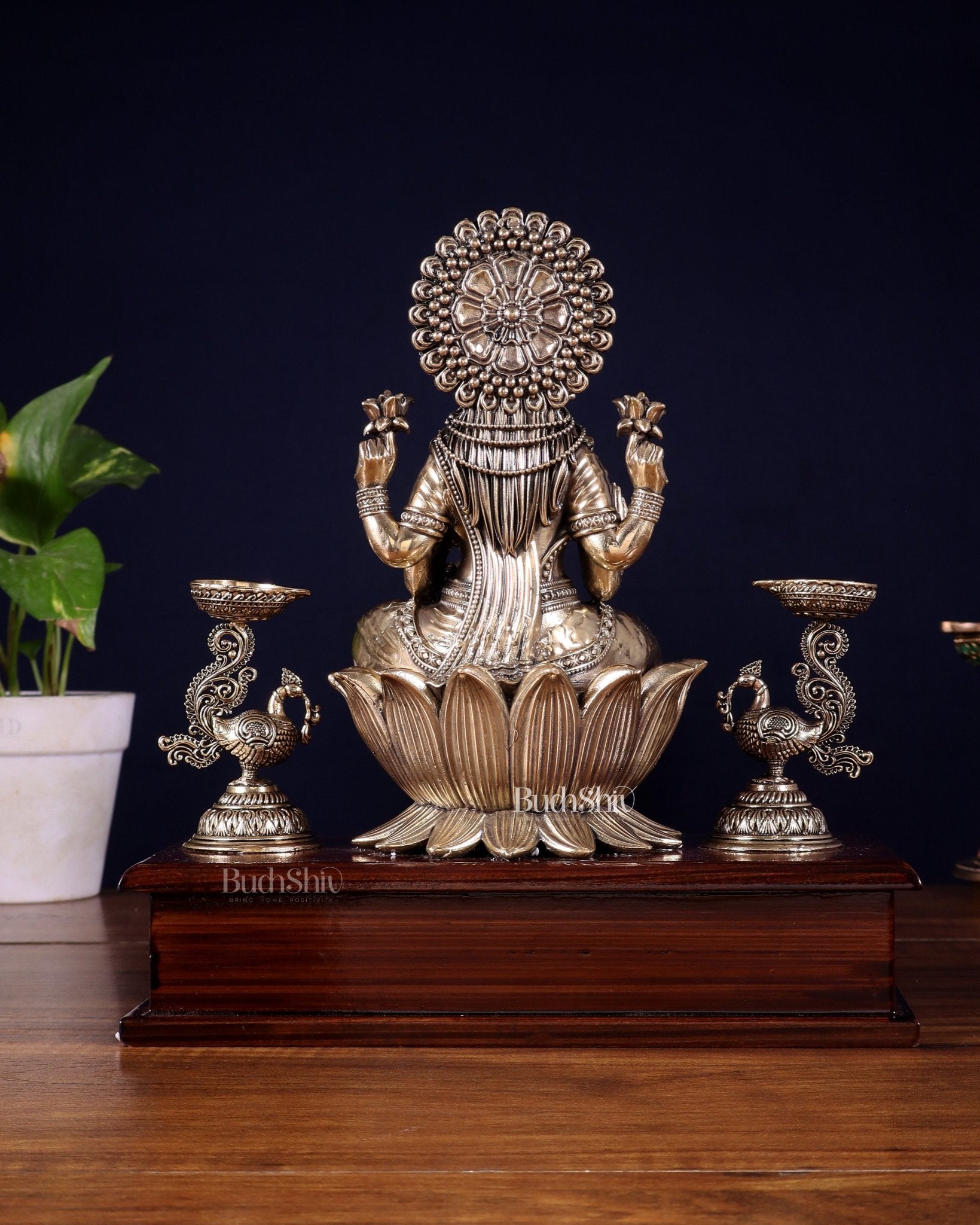 Brass Superfine Goddess Lakshmi Idol with Twin Peacock Lamps on Wooden Base – 9.5 Inch - Budhshiv.com