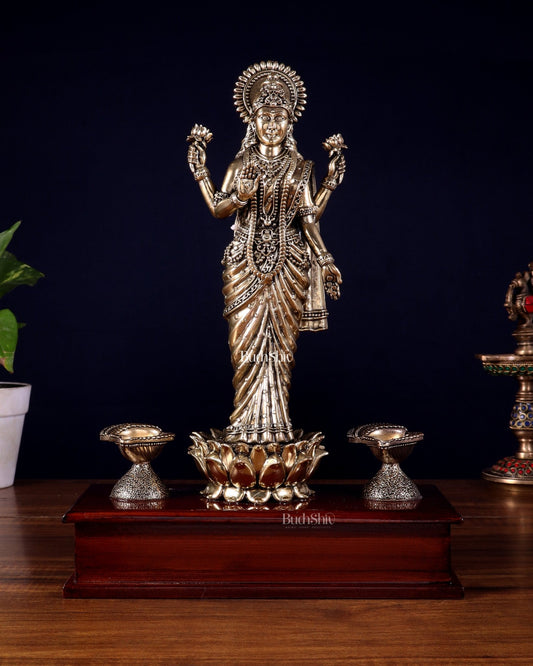 Brass Superfine Goddess Lakshmi Standing on Wooden Base with Diyas – 12.5 Inch - Budhshiv.com