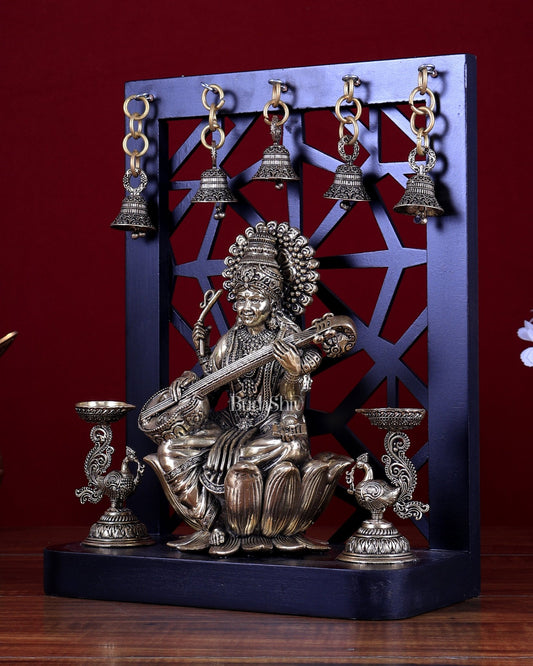 Brass Superfine Goddess Saraswati on Lotus with Annam Lamps & Hanging Bells - Budhshiv.com