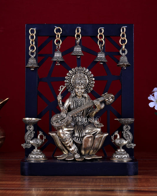 Brass Superfine Goddess Saraswati on Lotus with Annam Lamps & Hanging Bells - Budhshiv.com