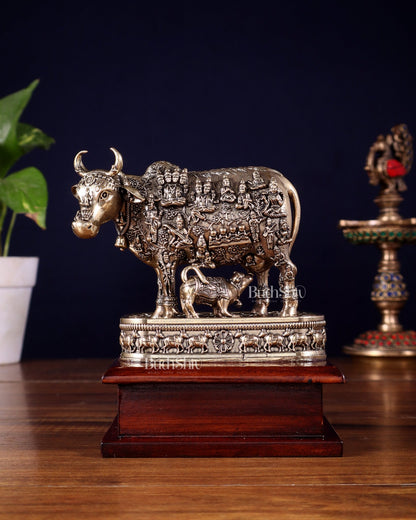 Brass Superfine Kamdhenu Cow with Calf – All Gods Engraved on Wooden Base (8.5 Inch) - Budhshiv.com