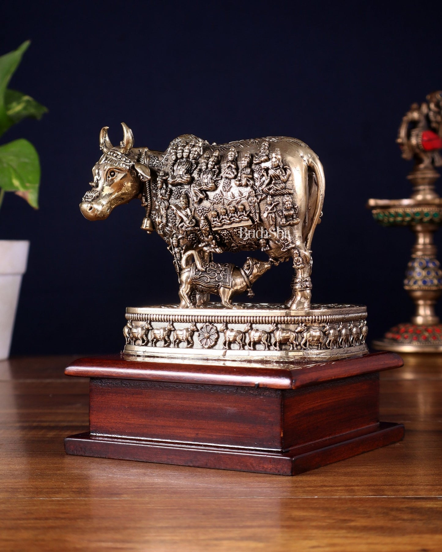 Brass Superfine Kamdhenu Cow with Calf – All Gods Engraved on Wooden Base (8.5 Inch) - Budhshiv.com