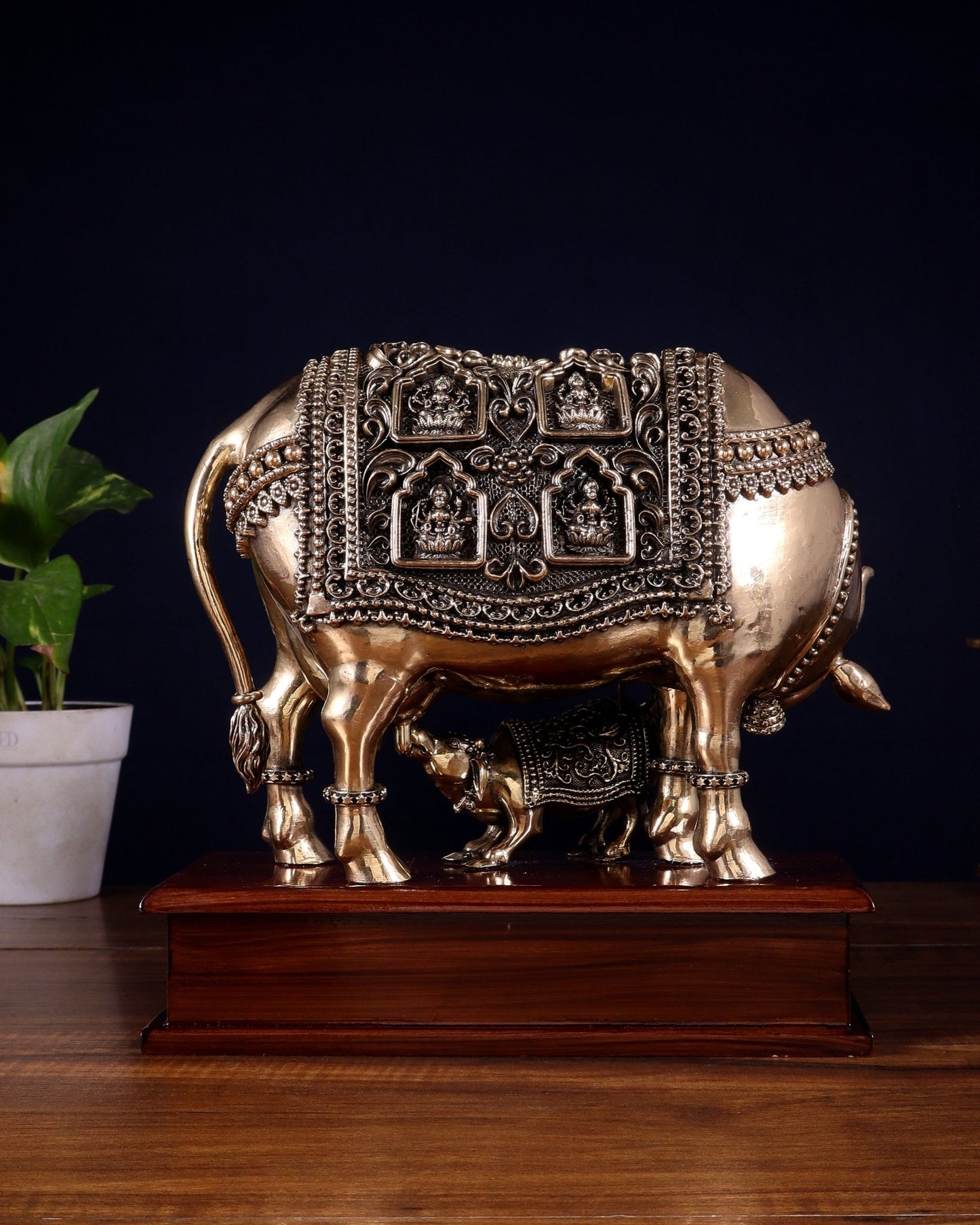 Brass Superfine Kamdhenu Cow with Calf with ashtalakshmi carvings on Wooden Base – 9.5 Inch - Budhshiv.com