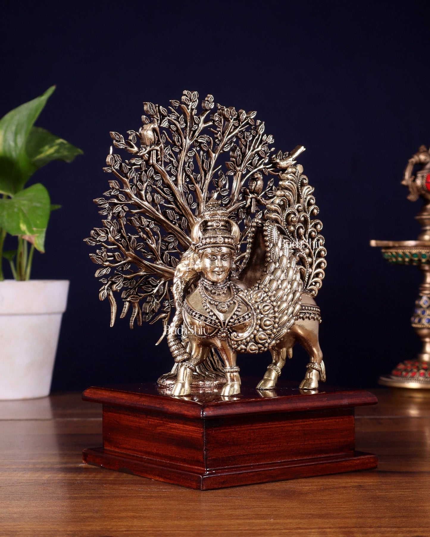 Brass Superfine Kamdhenu Cow with Goddess Face under Kalpavriksha tree on Wooden Base – 8 Inch - Budhshiv.com