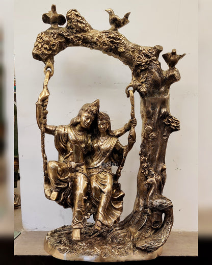 Brass Superfine Large Sized Radha krishna idols on a swing 23" - Budhshiv.com