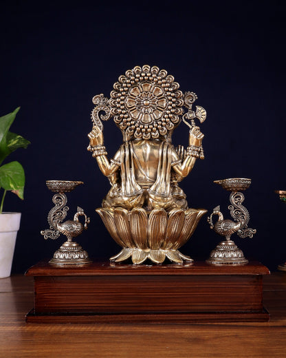 Brass Superfine Lord Ganesha Idol with Twin Peacock Lamps on Wooden Base – 9.5 Inch - Budhshiv.com