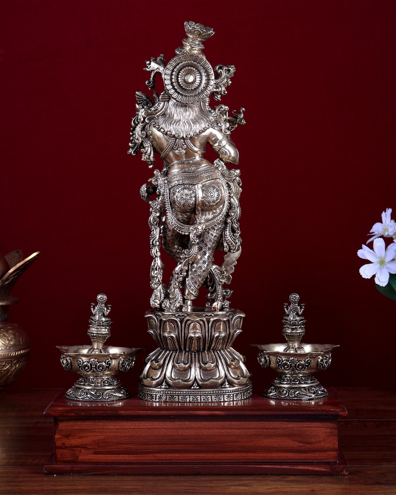 Brass Superfine Lord Krishna Idol with Twin Lakshmi Diyas on Wooden Base - Budhshiv.com