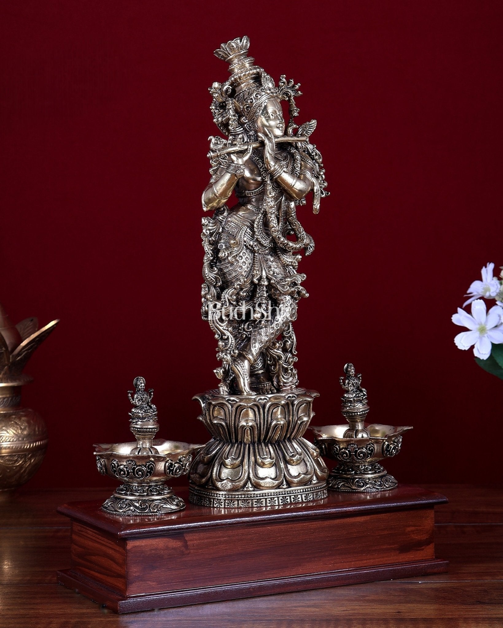 Brass Superfine Lord Krishna Idol with Twin Lakshmi Diyas on Wooden Base - Budhshiv.com