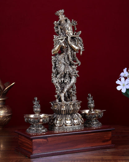 Brass Superfine Lord Krishna Idol with Twin Lakshmi Diyas on Wooden Base - Budhshiv.com