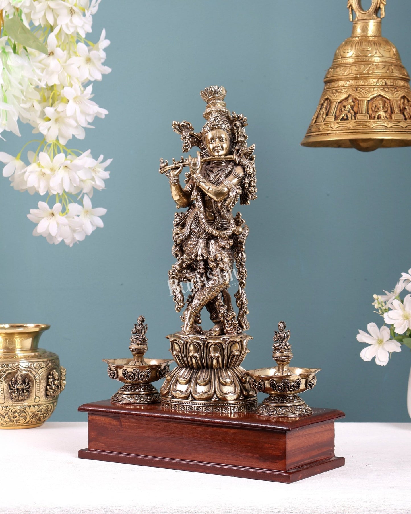 Brass Superfine Lord Krishna Idol with Twin Lakshmi Diyas on Wooden Base - Budhshiv.com