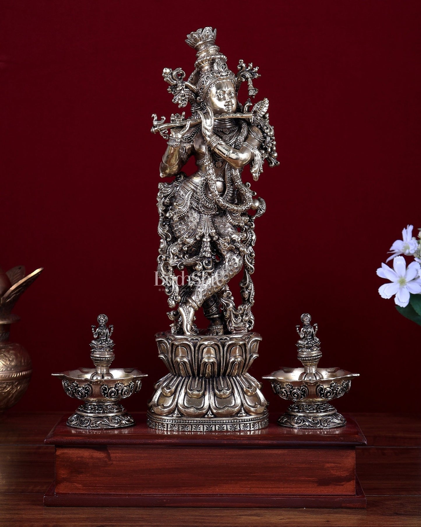 Brass Superfine Lord Krishna Idol with Twin Lakshmi Diyas on Wooden Base - Budhshiv.com