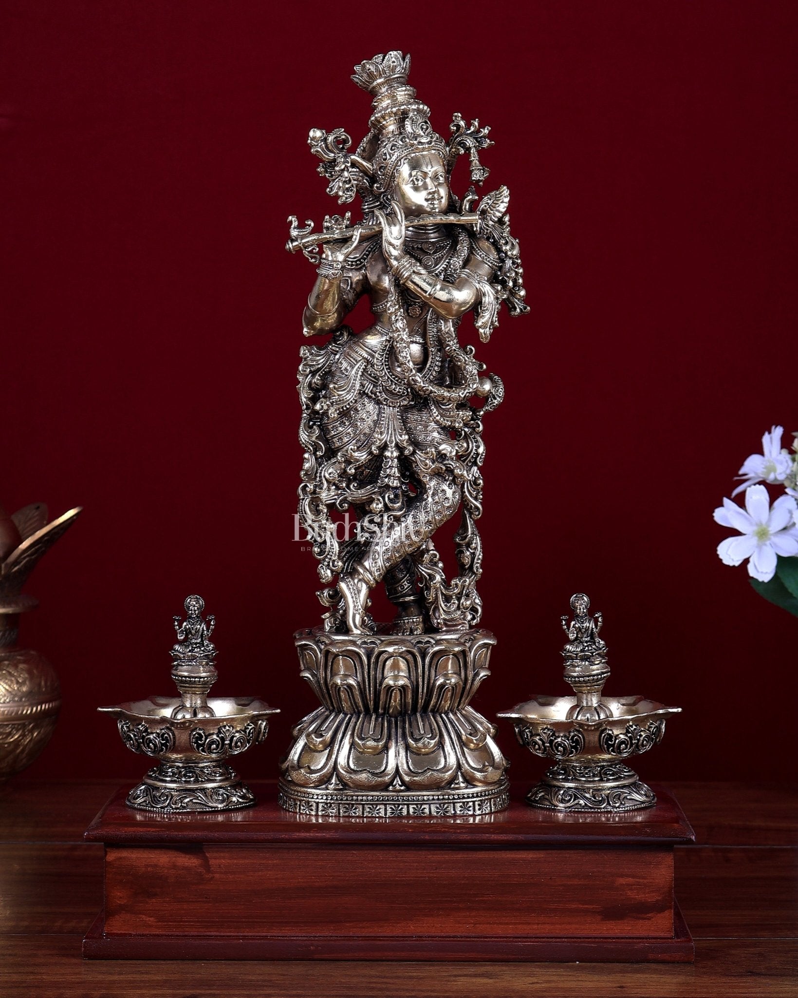 Brass Superfine Lord Krishna Idol with Twin Lakshmi Diyas on Wooden Base - Budhshiv.com
