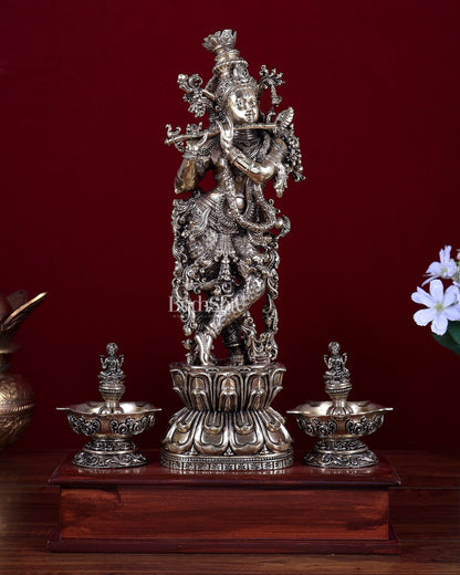 Brass Superfine Lord Krishna Idol with Twin Lakshmi Diyas on Wooden Base - Budhshiv.com