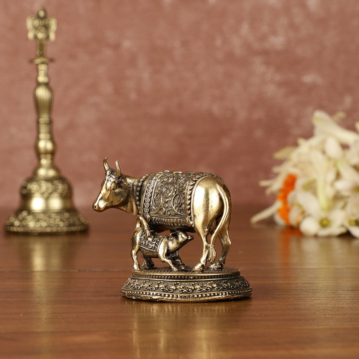 Brass superfine small Kamdhenu Cow with Calf Idol - 2" Tall - Budhshiv.com
