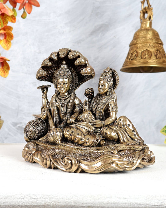 Brass Superfine Vishnu Lakshmi Resting on Sheshnaag Idol – Divine Reclining Vishnu Sculpture 8" - Budhshiv.com
