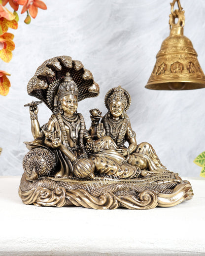 Brass Superfine Vishnu Lakshmi Resting on Sheshnaag Idol – Divine Reclining Vishnu Sculpture 8" - Budhshiv.com