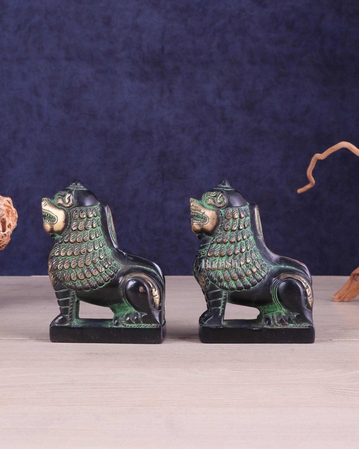 Brass Tibetan Snow Lion Pair – Antique Black & Green Finish - Budhshiv.com