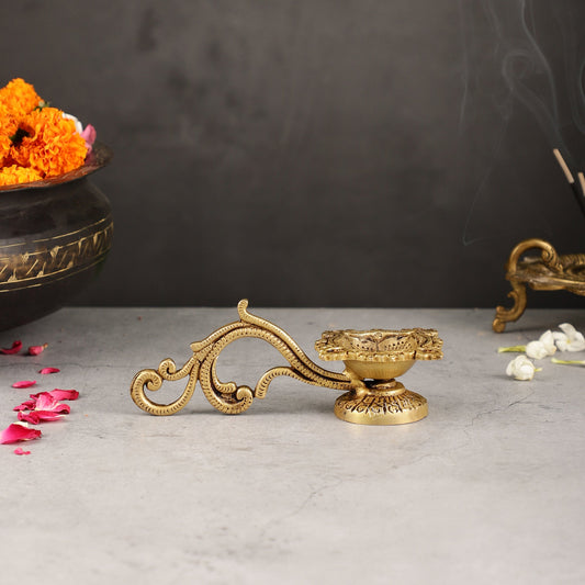 Brass unique diya with handle - Budhshiv.com