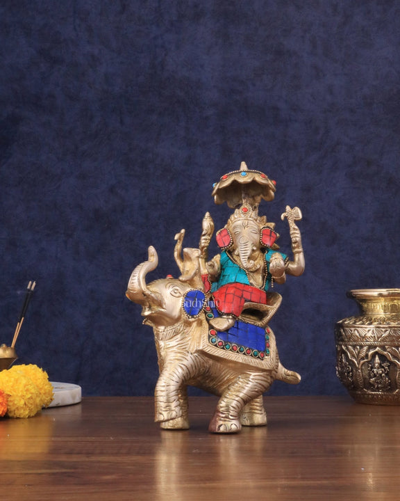 Ganesha sitting on elephant meenakari brass statue - Budhshiv.com
