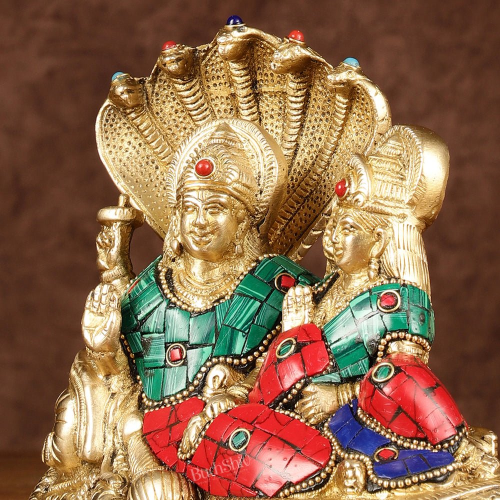 Lakshmi Narayan/ Vishnu Lakshmi brass idol resting on Sheshnaag Golden finish - Budhshiv.com