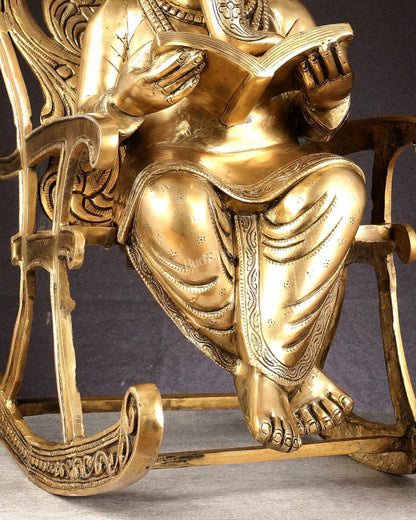 Pure Brass Ganesha Seated on a rocking Chair Reading Book | 24" large - Budhshiv.com