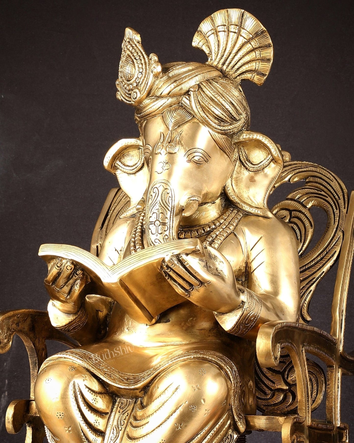 Pure Brass Ganesha Seated on a rocking Chair Reading Book | 24" large - Budhshiv.com
