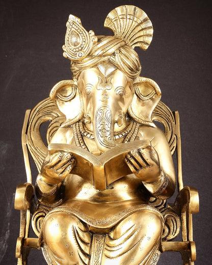 Pure Brass Ganesha Seated on a rocking Chair Reading Book | 24" large - Budhshiv.com