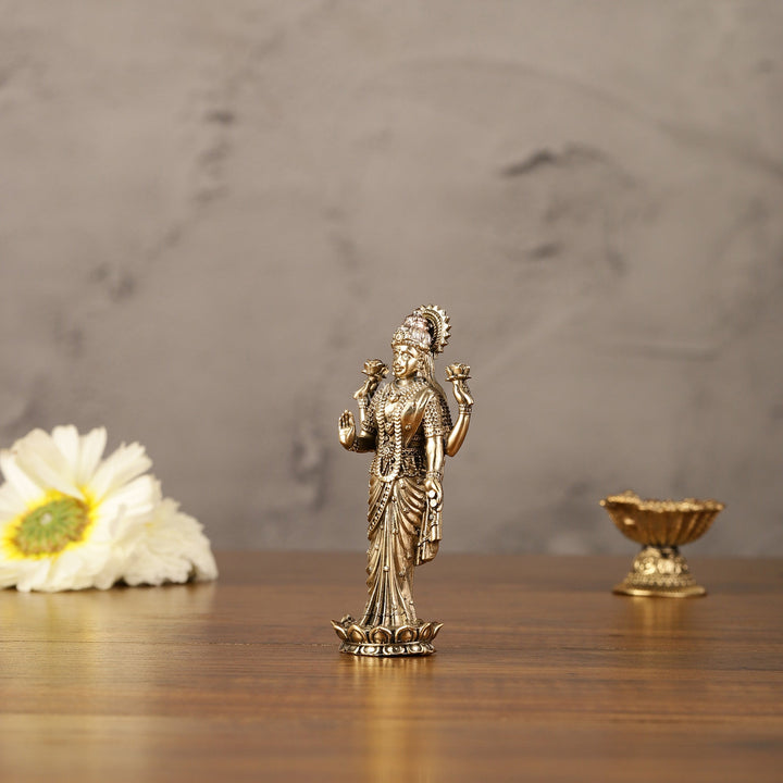 Pure brass lightweight Standing goddess Lakshmi idol 4" - Budhshiv.com
