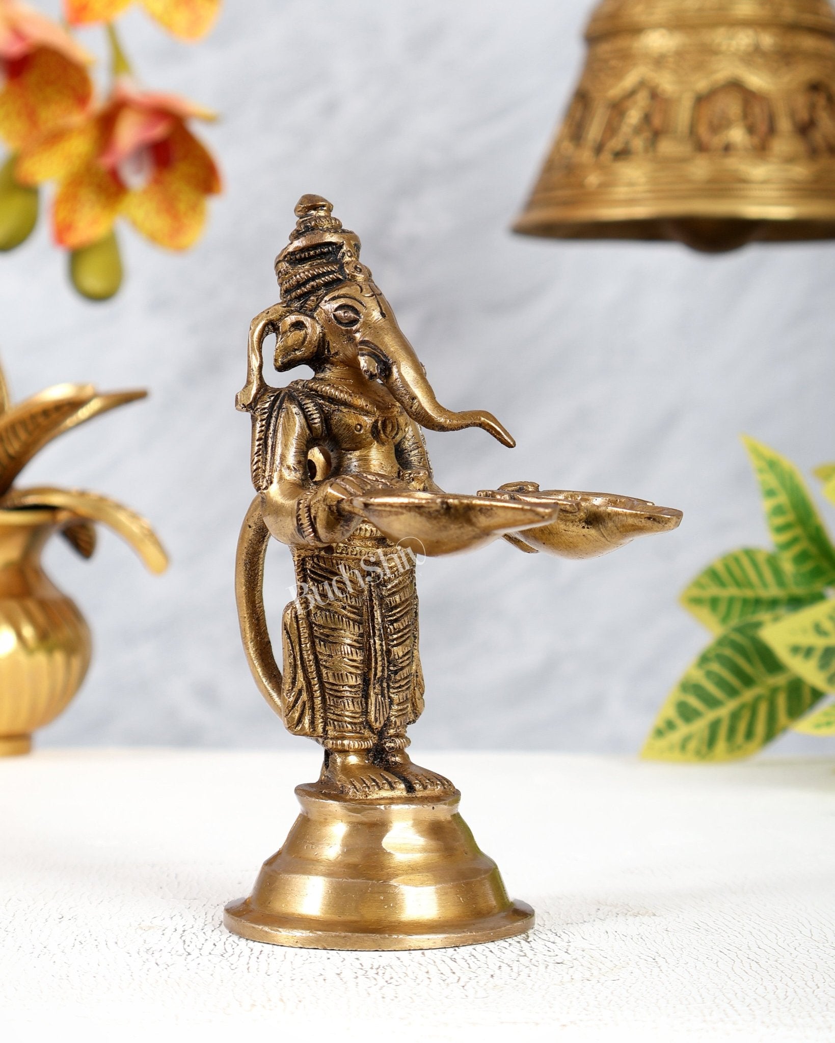 Pure Brass Lord Ganesha Holding Two Diyas small 5.5" - Budhshiv.com
