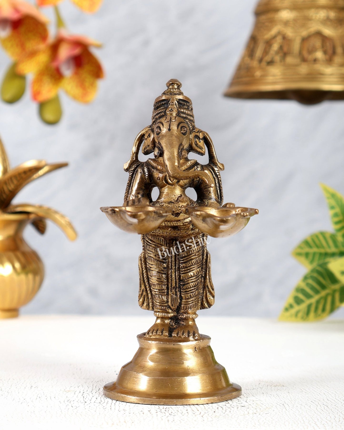 Pure Brass Lord Ganesha Holding Two Diyas small 5.5" - Budhshiv.com