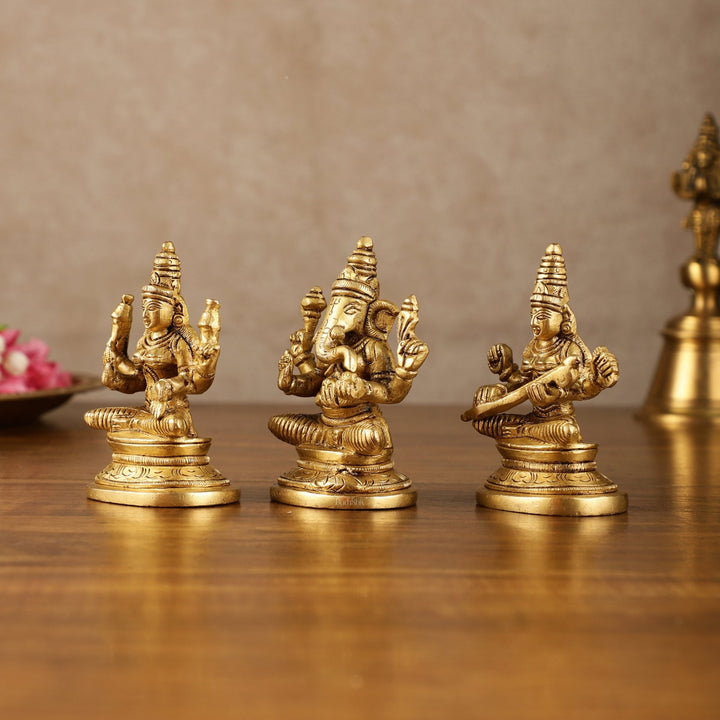 Pure Brass Small Lord Ganesha, Goddess Lakshmi, and Goddess Saraswati Idol Set | 3.5 Inch - Budhshiv.com