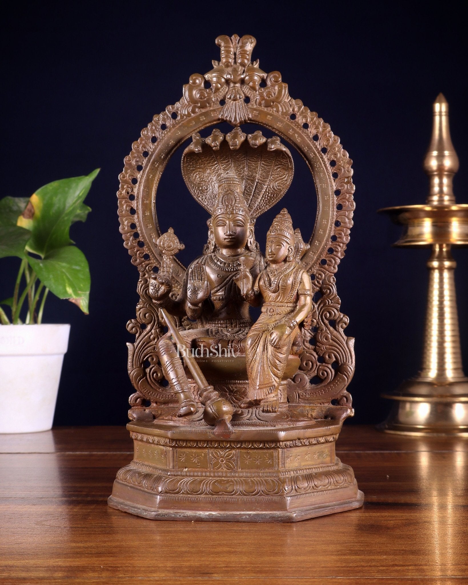 Pure Brass Vishnu Lakshmi Idol Seated on Sheshanaaga - 10" copper tone - Budhshiv.com