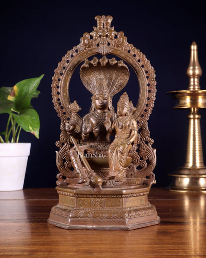 Pure Brass Vishnu Lakshmi Idol Seated on Sheshanaaga - 10" copper tone - Budhshiv.com