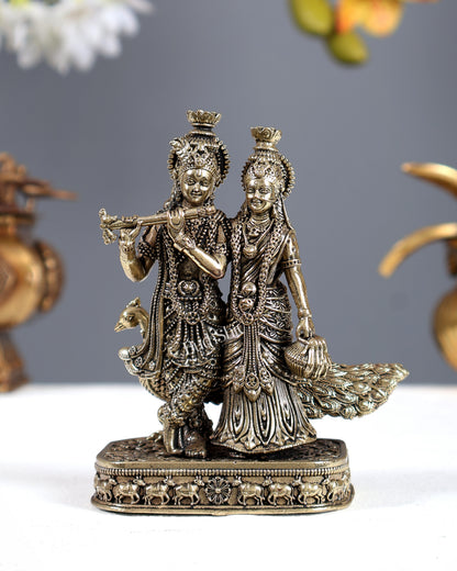 Brass Radha Krishna with Peacock Idol – Superfine Divine Miniature Statue (4 Inches)
