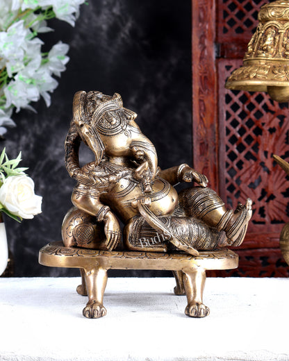 Unique Brass Resting Ganesha with Long Braided Hair – Handcrafted Masterpiece