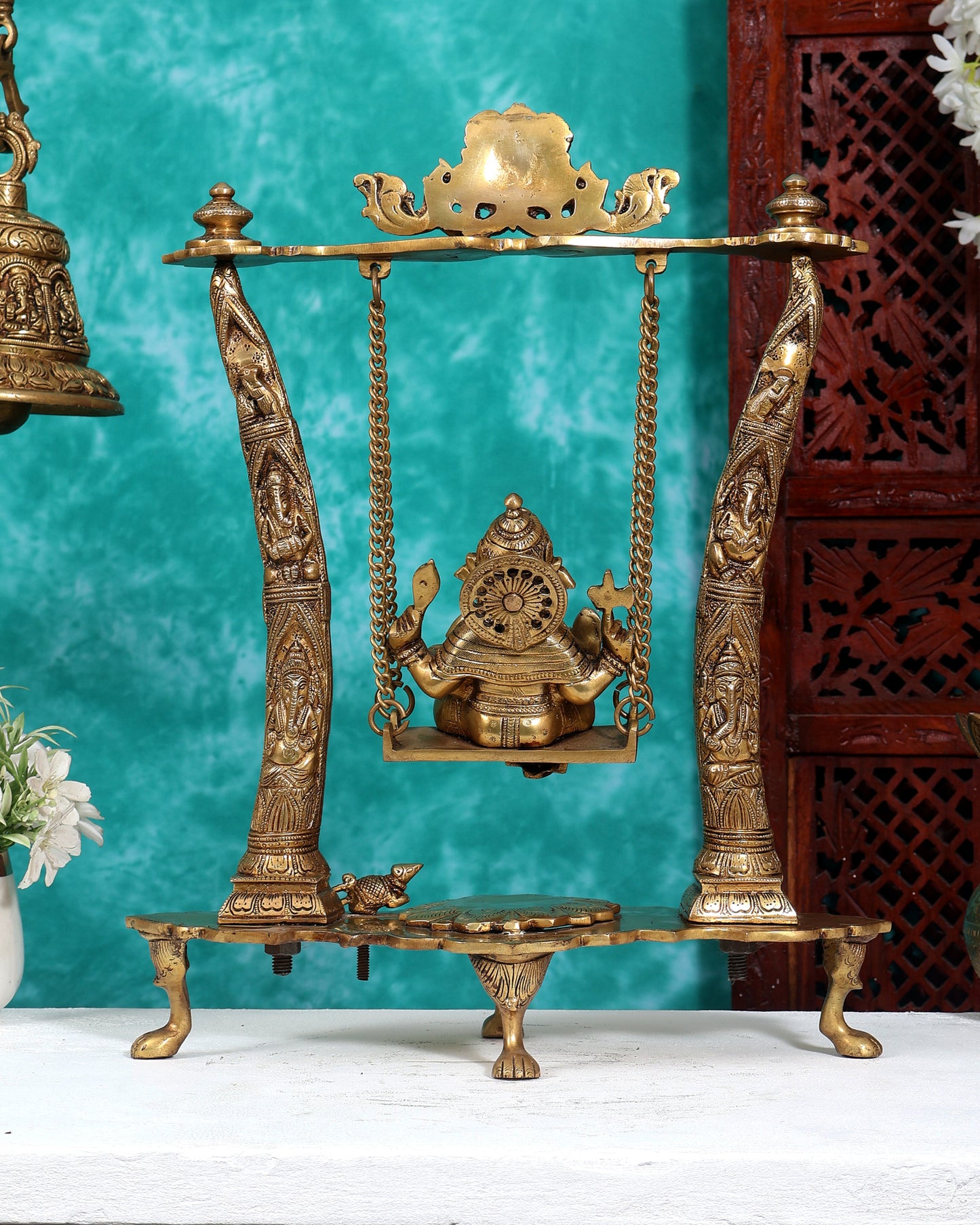 Brass Ganesha Idol on Swing with Pillars Decorated with Ganesha Figures 17 inch