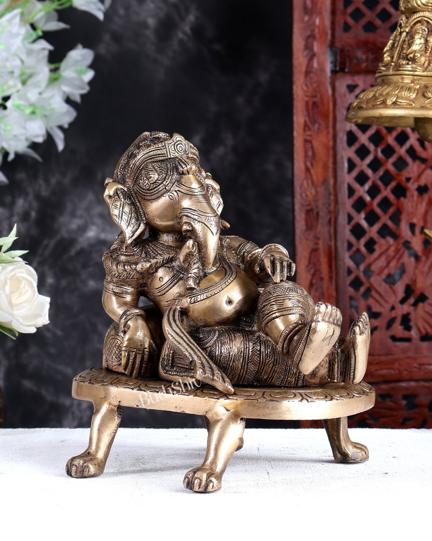 Unique Brass Resting Ganesha with Long Braided Hair – Handcrafted Masterpiece