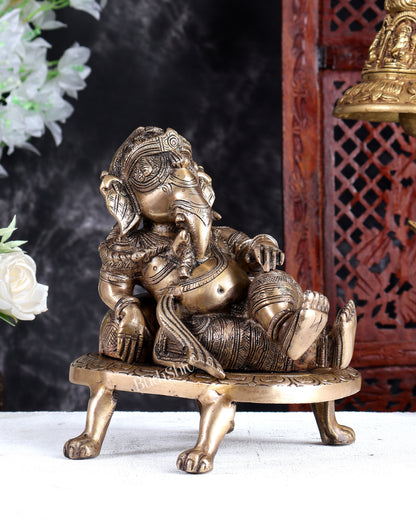 Unique Brass Resting Ganesha with Long Braided Hair – Handcrafted Masterpiece