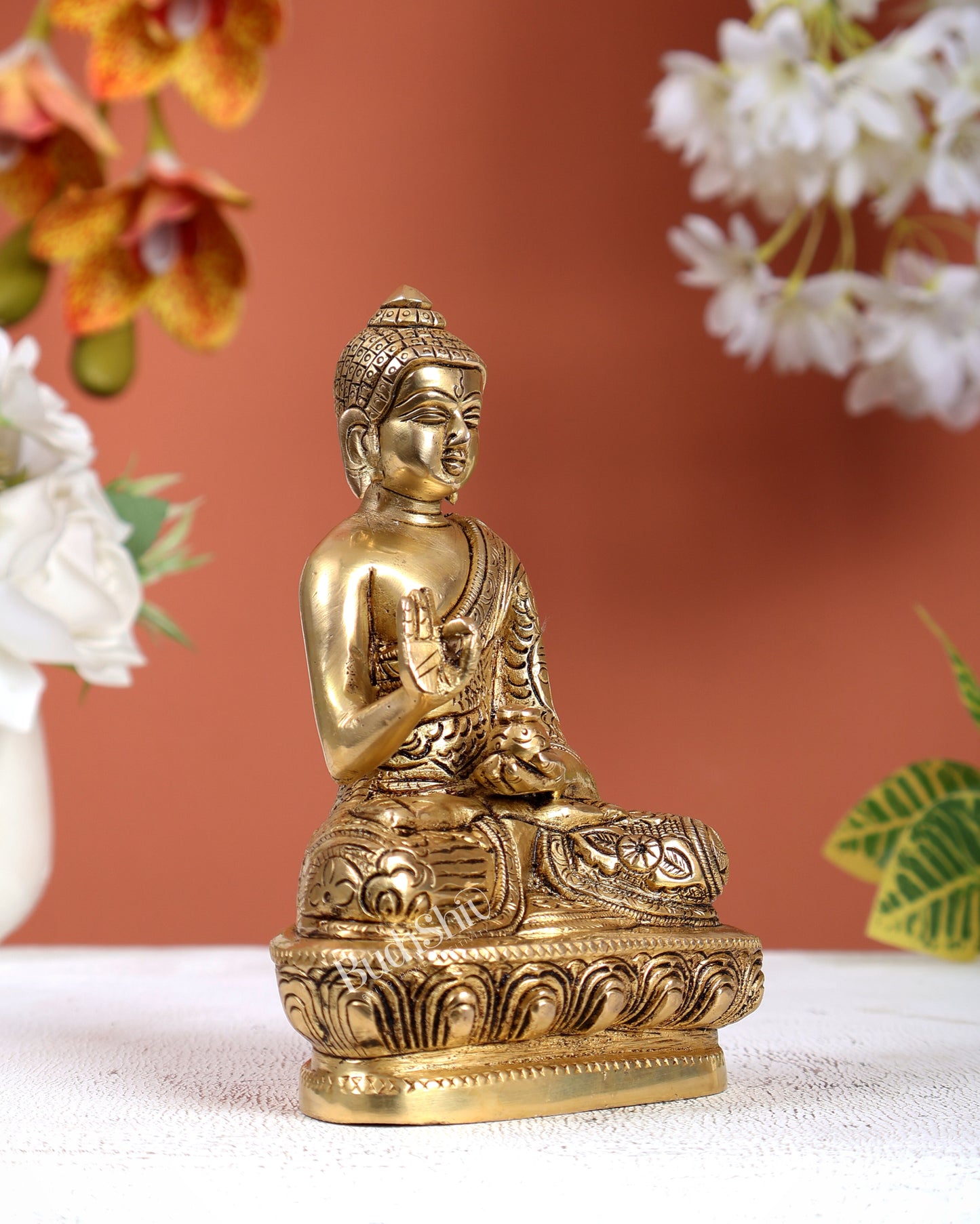 Brass Buddha Statue with Dragon Carvings – Intricately Detailed Small Sculpture
