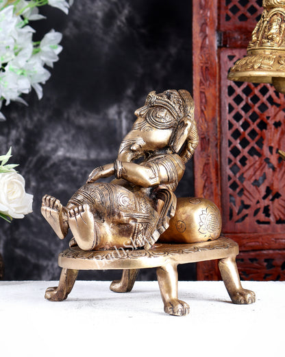 Unique Brass Resting Ganesha with Long Braided Hair – Handcrafted Masterpiece