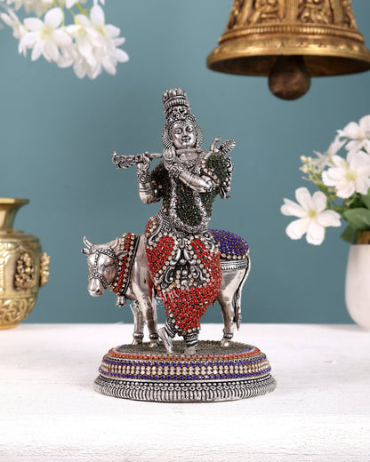 Superfine Brass Krishna with Cow idol silver plated with jewellers stonework - 7" - Budhshiv.com