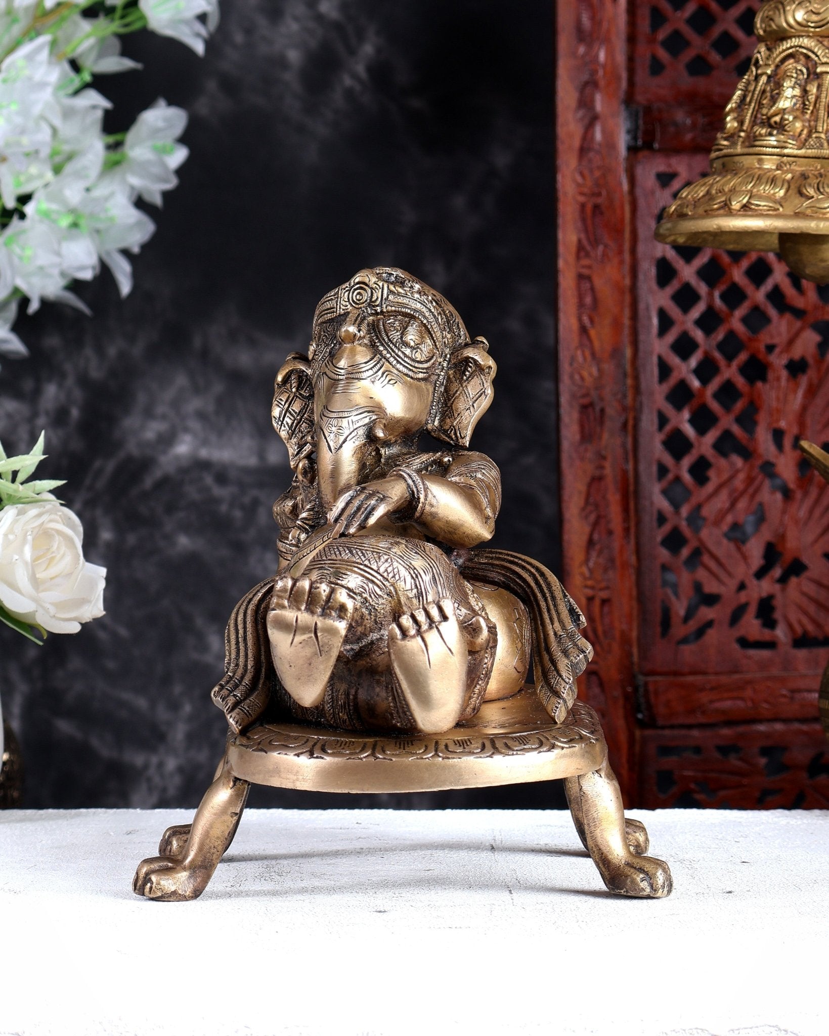 Unique Brass Resting Ganesha with Long Braided Hair – Handcrafted Masterpiece - Budhshiv.com