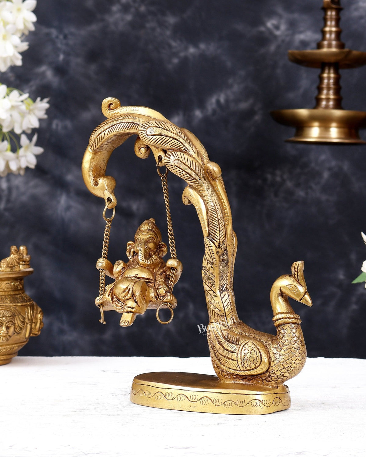 Unique Pure Brass Lord Ganesha on a Peacock Swing Idol - Budhshiv.com