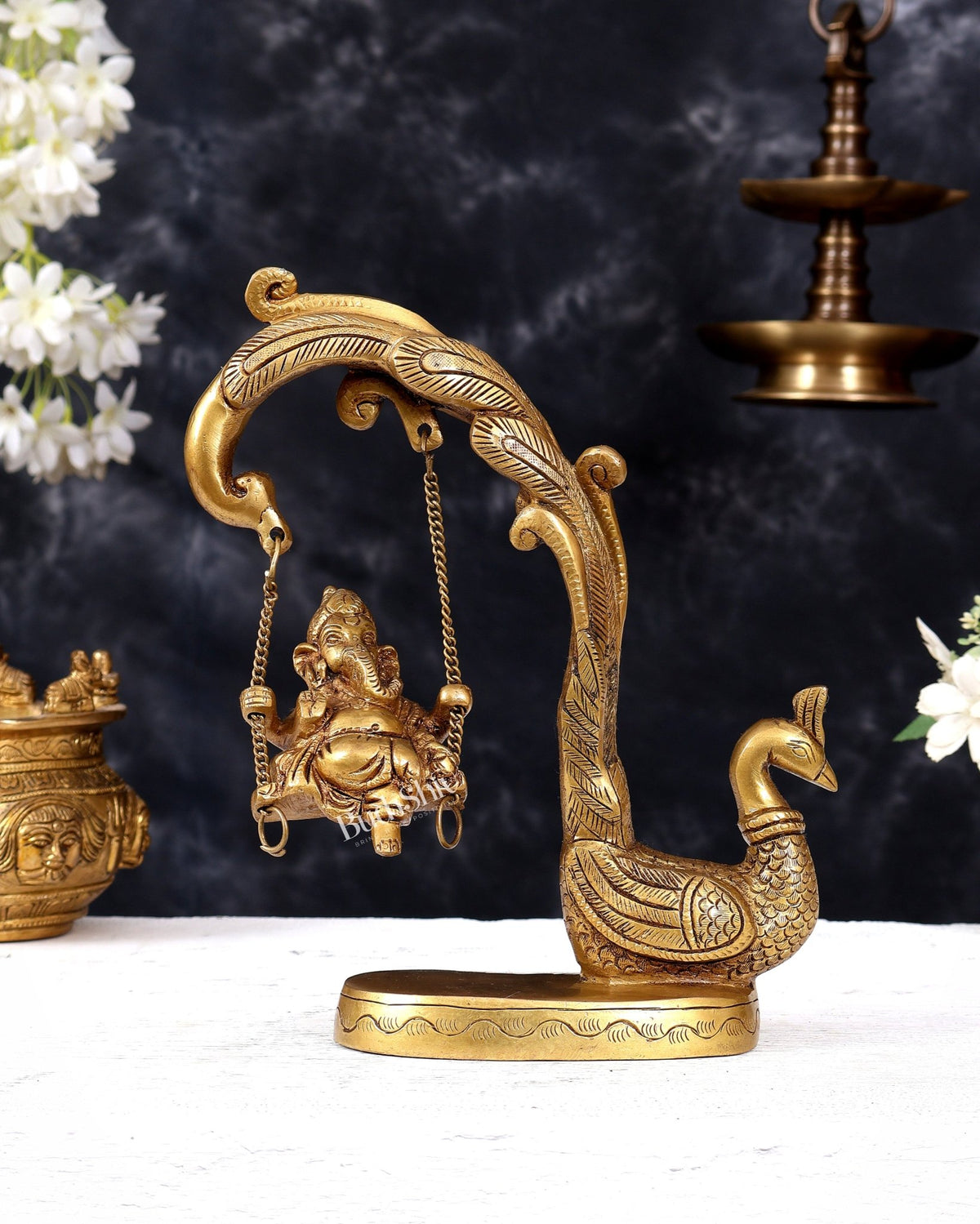 Unique Pure Brass Lord Ganesha on a Peacock Swing Idol - Budhshiv.com