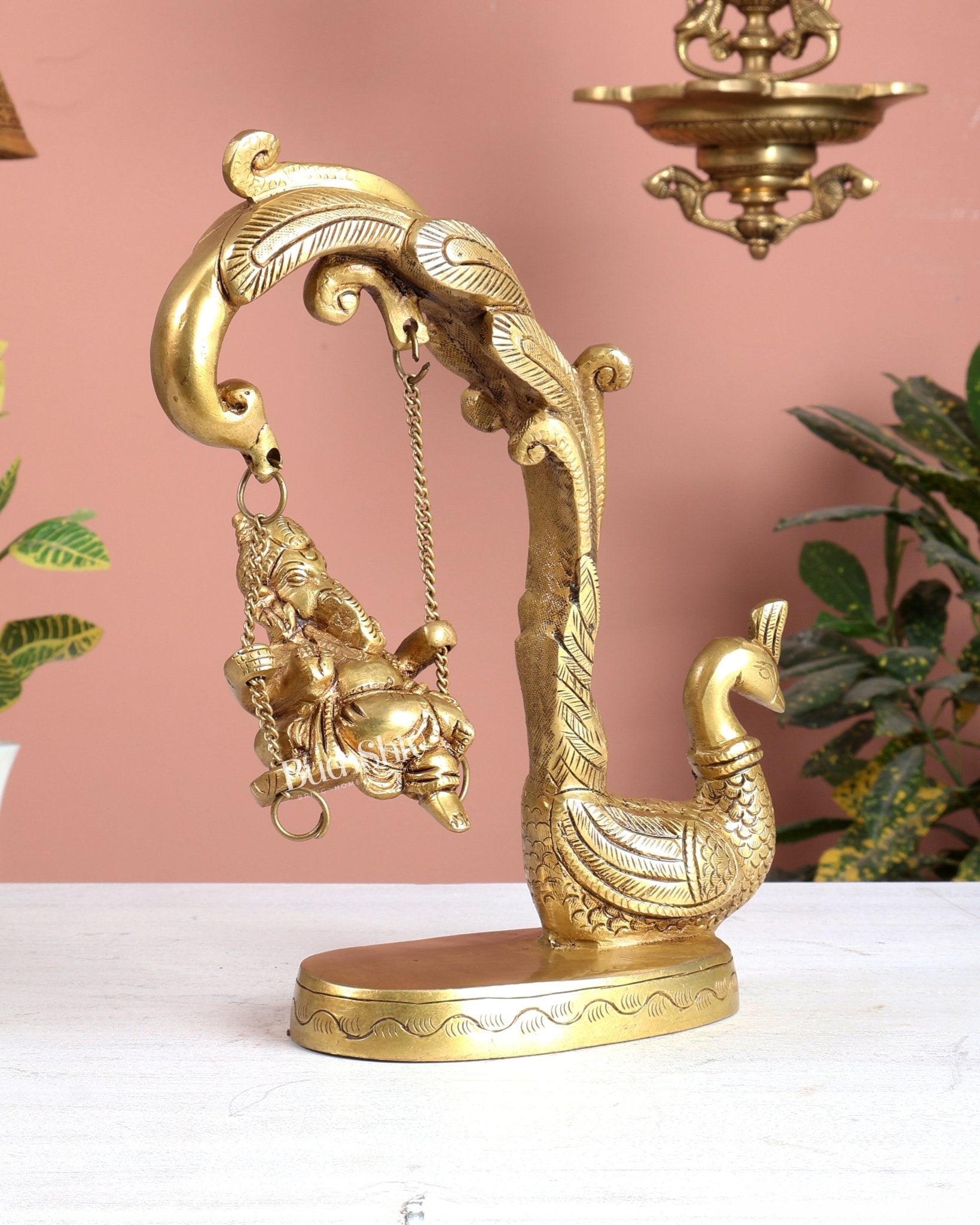 Unique Pure Brass Lord Ganesha on a Peacock Swing Idol - Budhshiv.com
