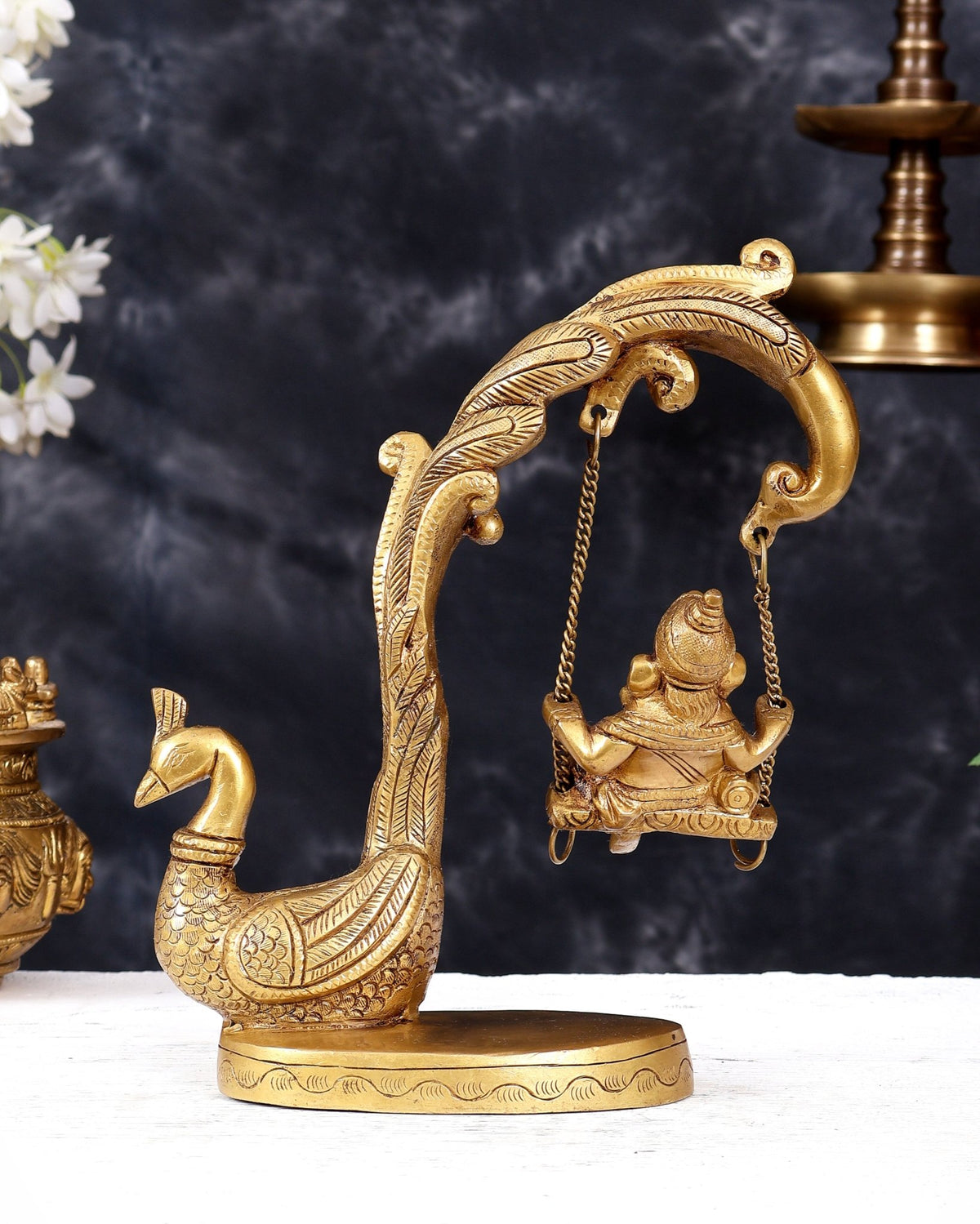 Unique Pure Brass Lord Ganesha on a Peacock Swing Idol - Budhshiv.com