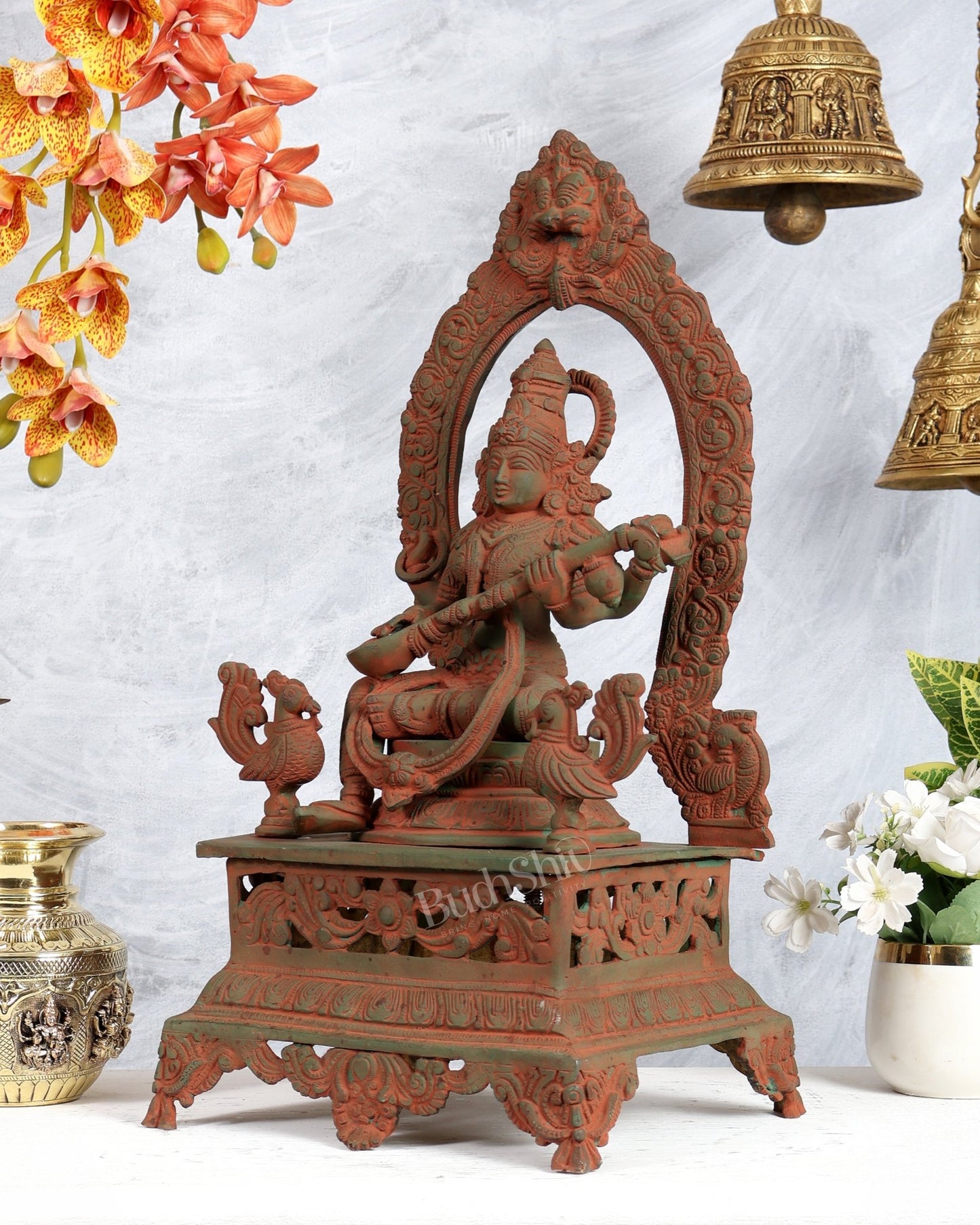Vintage Brass Goddess Saraswati on Mayur Aasan – Dual Peacock Singhasan, Antique Green & Pink Sand Finish (20.5 Inches) - Budhshiv.com