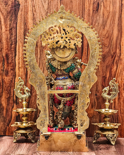 Exquisite stonework details on the Superfine Brass Krishna Statue. back view