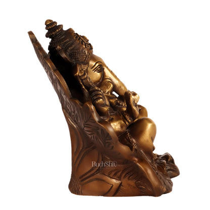 Beautifully Handcrafted Brass Ganapathi Statue Seated on Leaf Throne - 7" Height - Budhshiv.com