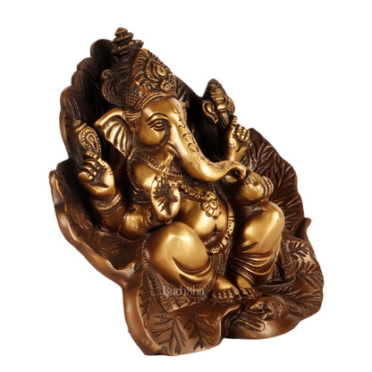 Beautifully Handcrafted Brass Ganapathi Statue Seated on Leaf Throne - 7" Height - Budhshiv.com